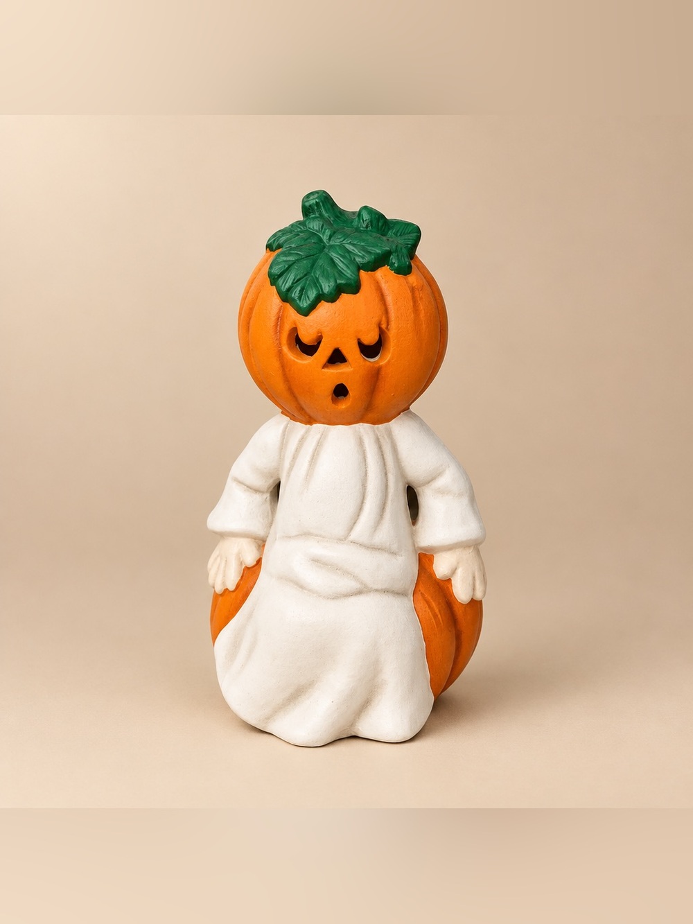 1988 Ceramic pumpkin head ghost sitting on pumpkin